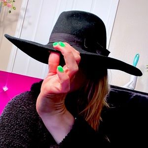 Black, felt, wide brimmed hat with sateen ribbon